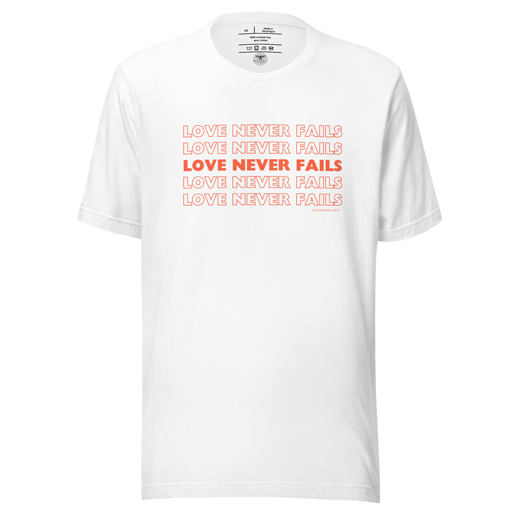 Front view of White 'Love Never Fails' T-shirt displaying the red text.