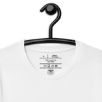 White 'Love Never Fails' T-shirt on wooden hanger.. Close-up of 'Love Never Fails' text on White T-shirt.